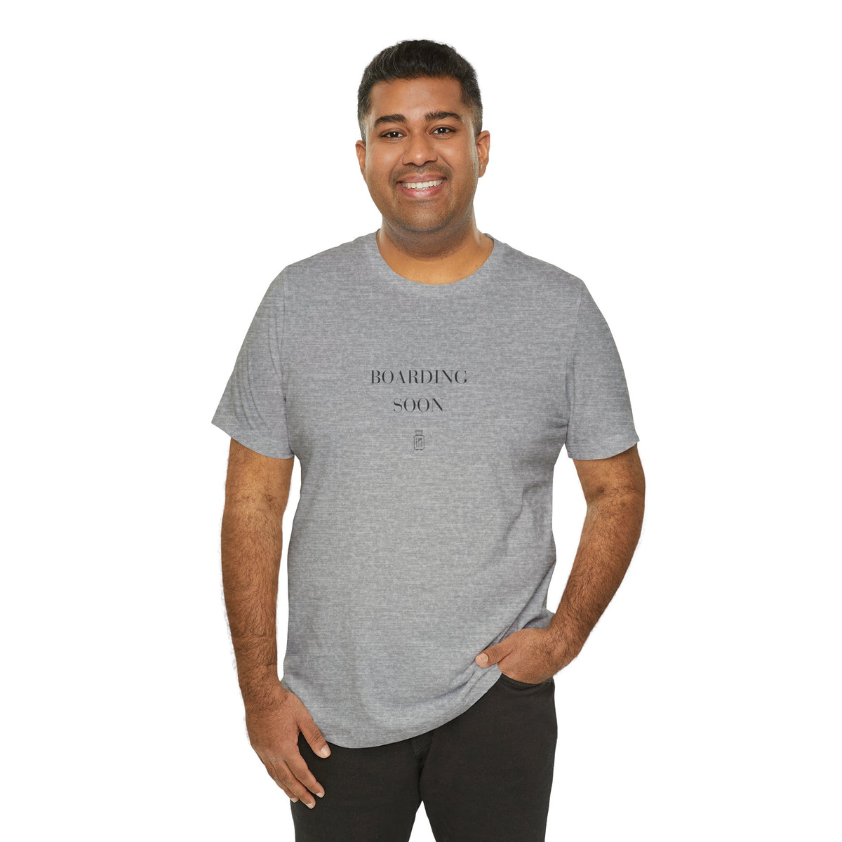 Man wearing the Boarding Soon Bella+Canvas 3001 unisex travel tee