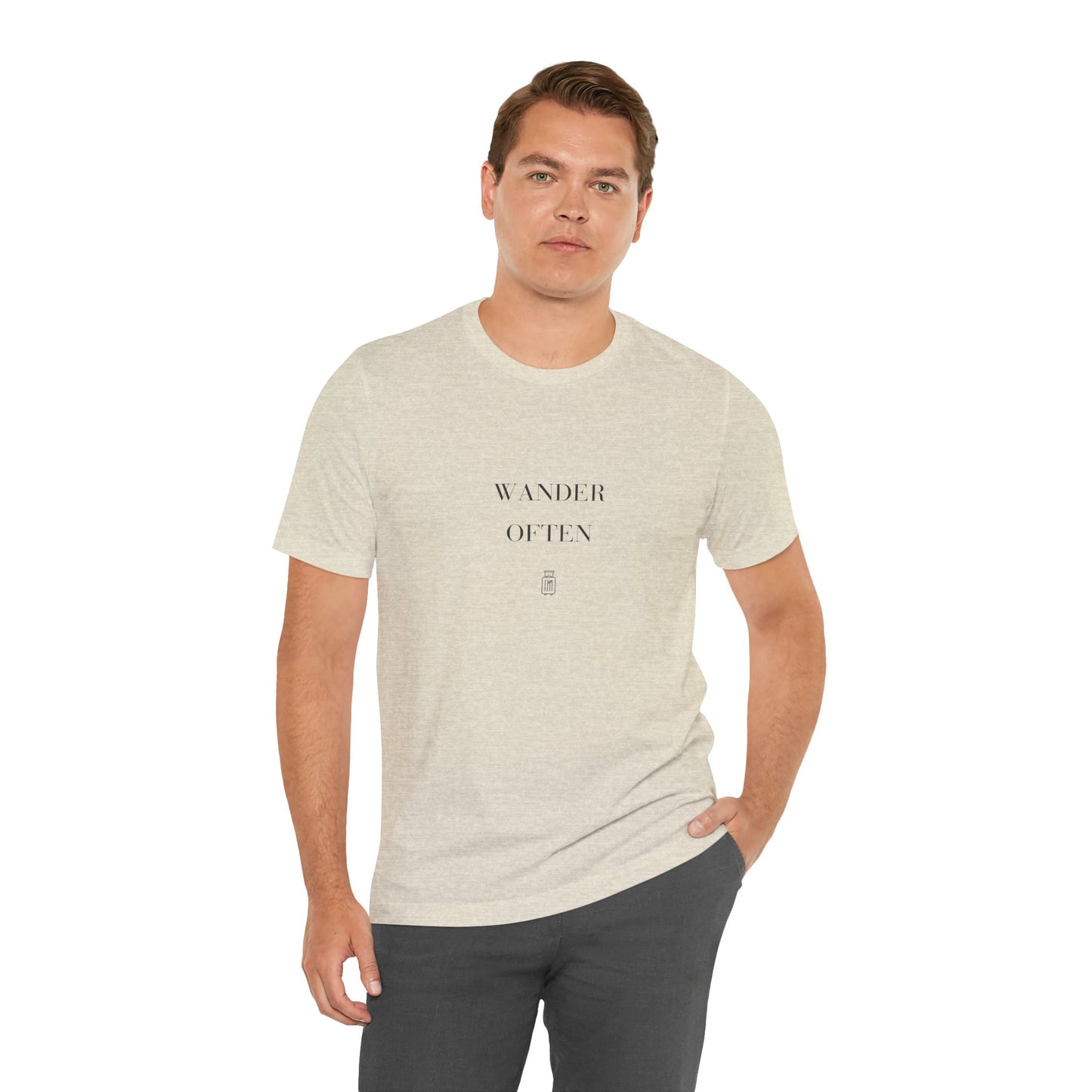 Man wearing the Wander Often Bella+Canvas 3001 unisex travel tee