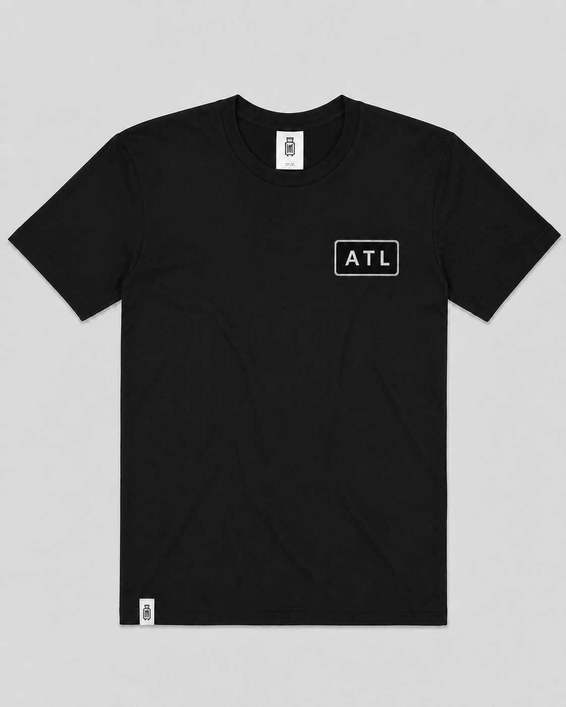 Black t-shirt with 'ATL' logo on a gray background