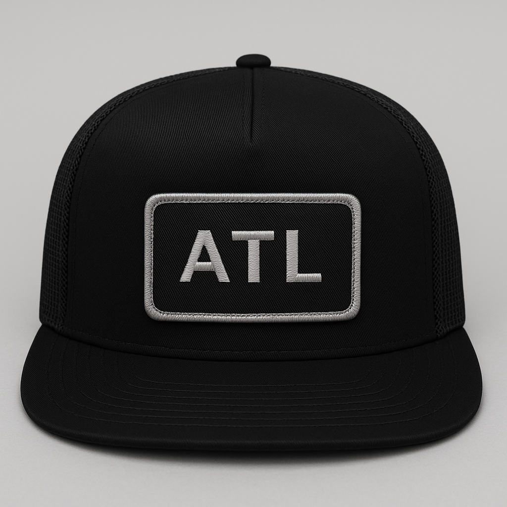 Front view of ATL Atlanta airport trucker hat mesh snapback black
