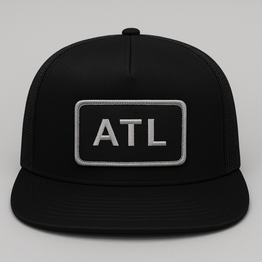 Front view of ATL Atlanta airport trucker hat mesh snapback black