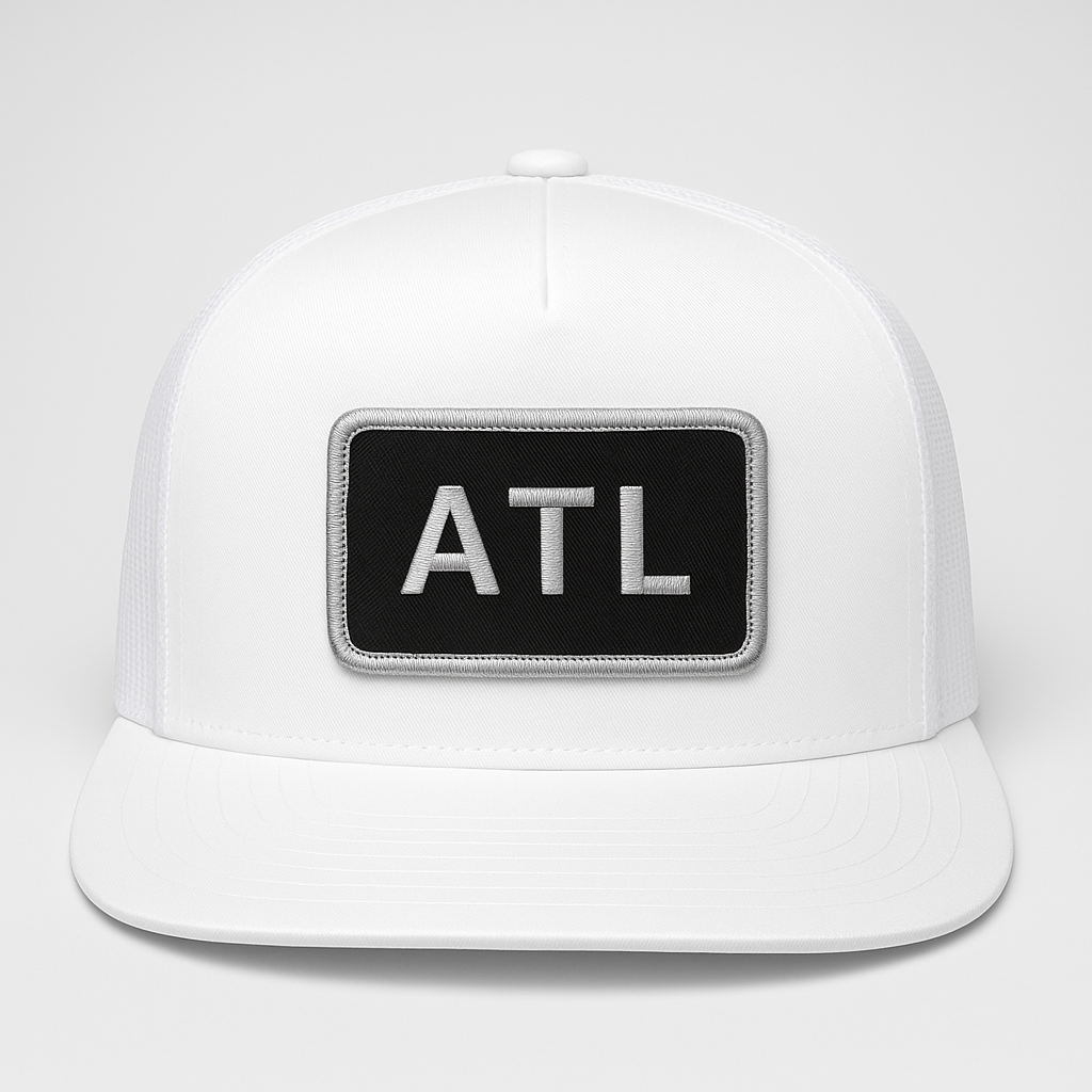 Front view of ATL Atlanta airport trucker hat mesh snapback white
