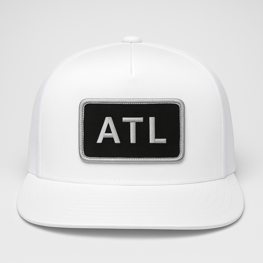 Front view of ATL Atlanta airport trucker hat mesh snapback white