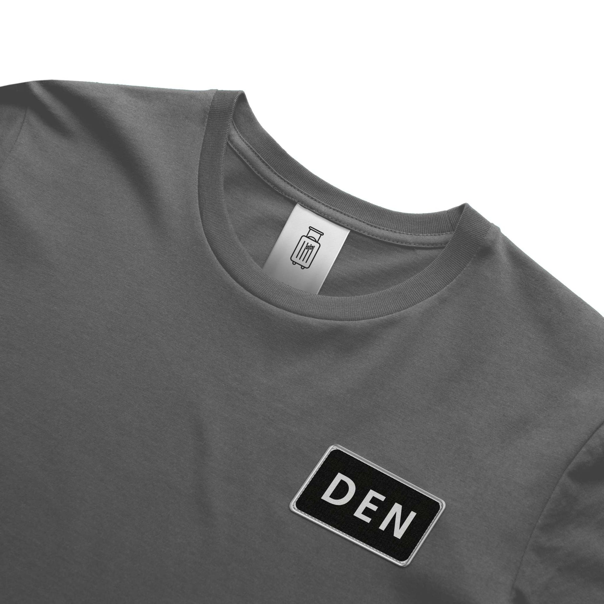 Close-up of DEN airport code design on ultra premium t-shirt gray