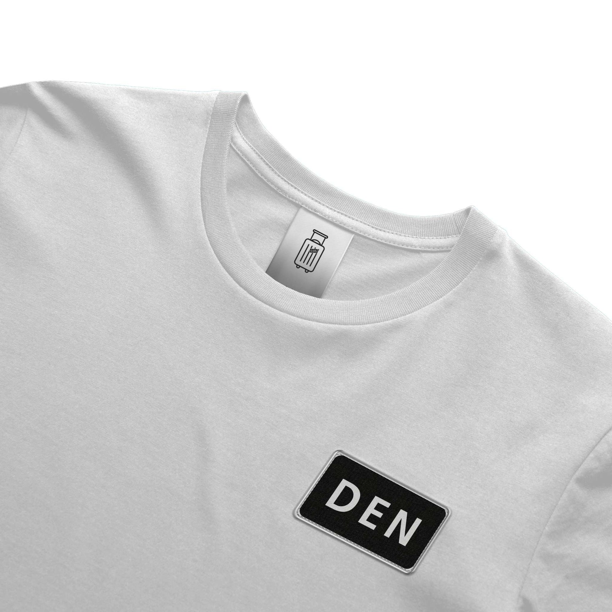 Close-up of DEN airport code design on ultra premium t-shirt white