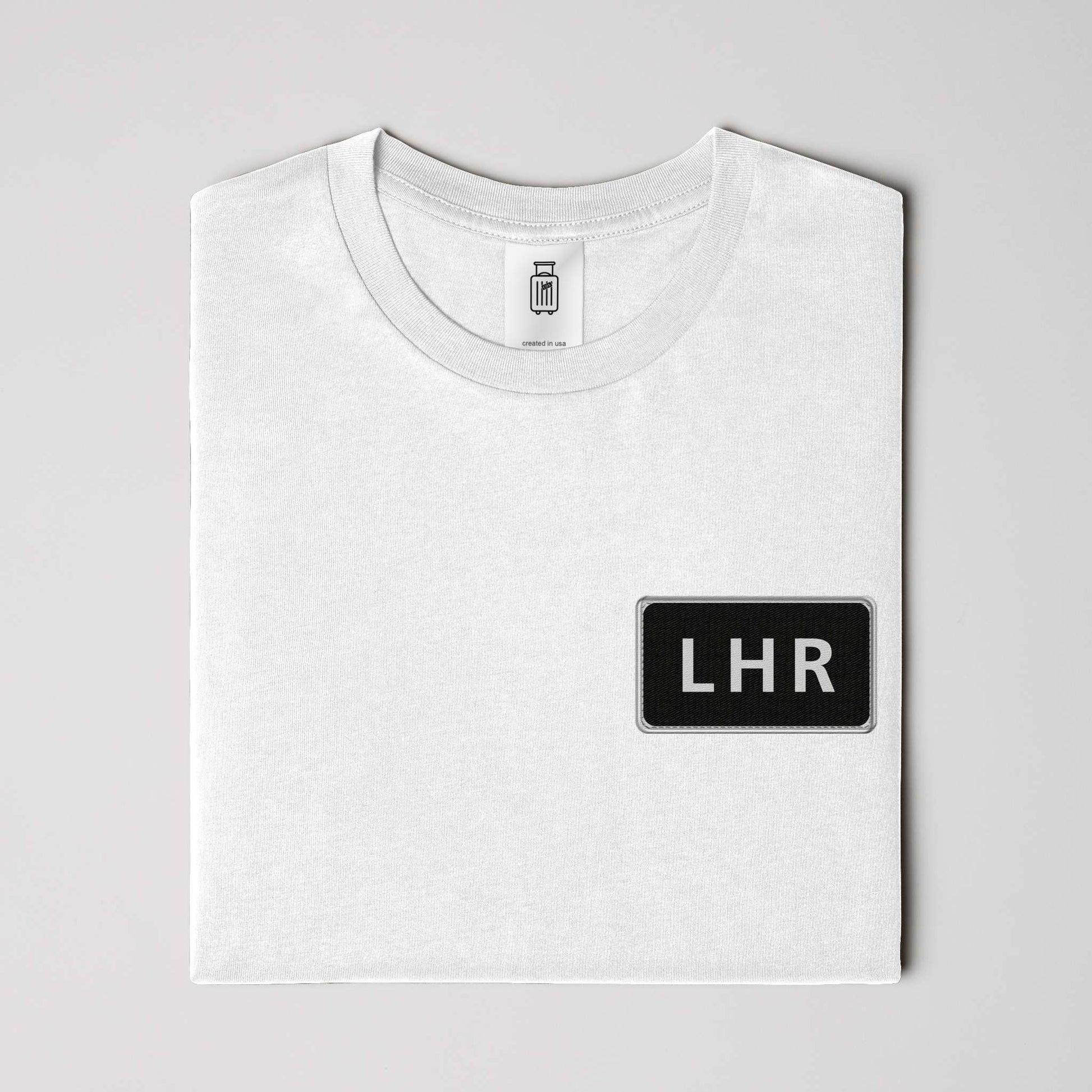 Close-up of LHR airport code design on ultra premium t-shirt white