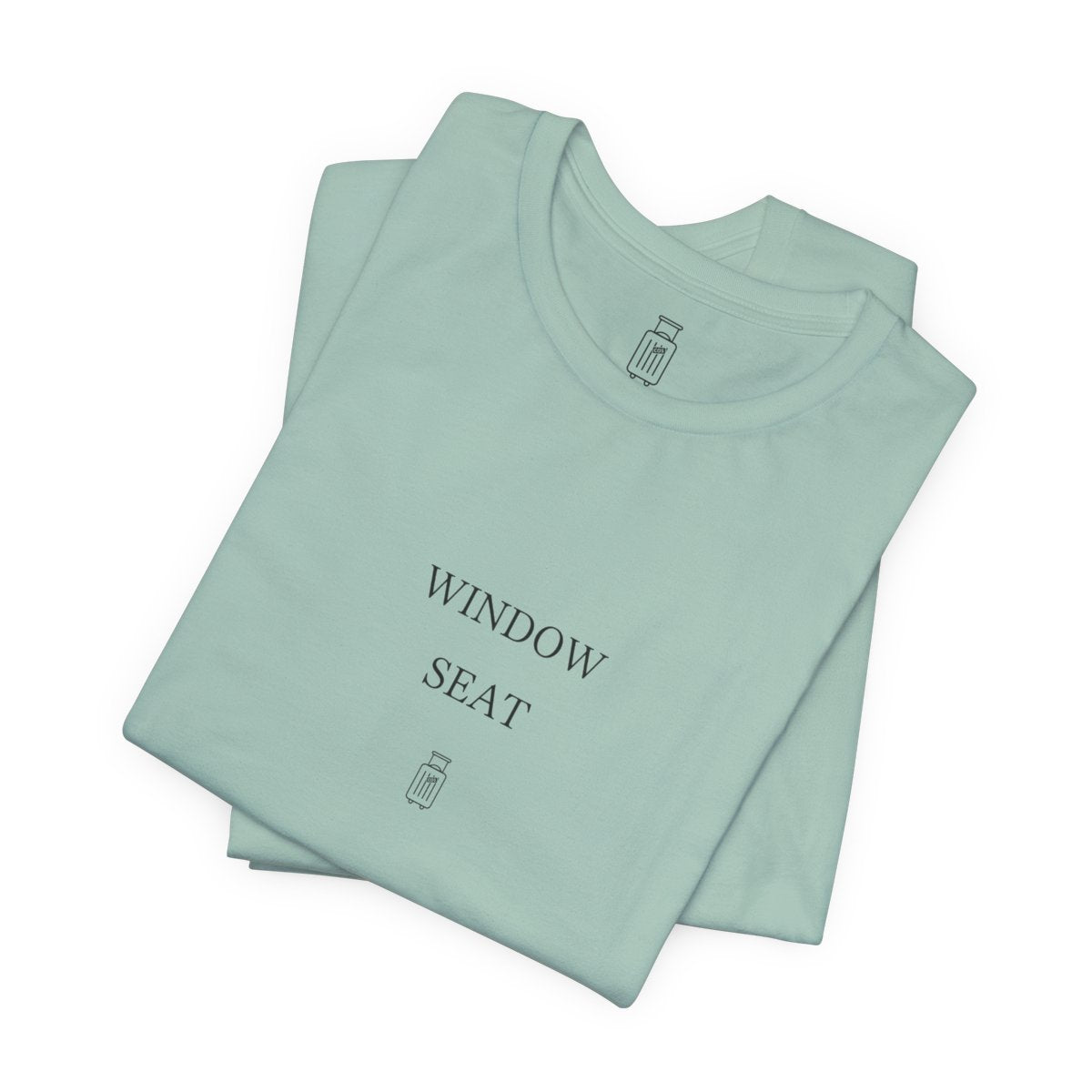 Window Seat travel tee in Dusty Blue, folded view